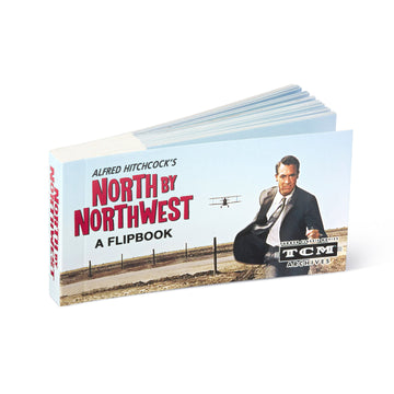 Flipbook titled 'North by Northwest' by Alfred Hitchcock with a cover featuring a man and airplane. by Alfred Hitchcock Academy Museum Store Los Angeles.
